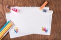 Colored pencils with sheets of paper Royalty Free Stock Photo