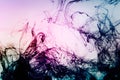 Colored photo of dissolving dye ink in water