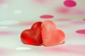 Colored (pink, red and orange), transparent heart shape jellies, colored degradee background Royalty Free Stock Photo