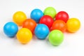 Colored plastic balls on white background Royalty Free Stock Photo