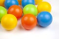 Colored plastic balls on white background Royalty Free Stock Photo