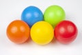 Colored plastic balls on white background. leisure and game items. round objects Royalty Free Stock Photo