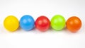 Colored plastic balls on white background. leisure and game items. round objects Royalty Free Stock Photo