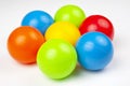 Colored plastic balls on white background. leisure and game items. round objects Royalty Free Stock Photo
