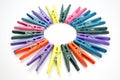 Colored plastic clothespins for clothes on a white background Royalty Free Stock Photo