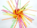 Colored plastic drinking straws on a white background Royalty Free Stock Photo