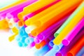 Colored plastic drinking straws on a white background Royalty Free Stock Photo