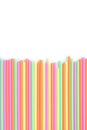 Colored plastic drinking straws on a white background Royalty Free Stock Photo