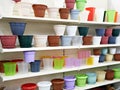 Plastic flower pots on counter in store Royalty Free Stock Photo
