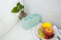 Colored plastic lunchboxes on the table