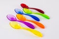 Colored plastic spoons Royalty Free Stock Photo