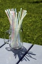 Colored plastic straws in glass jar Royalty Free Stock Photo