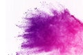 Colored powder explosion. Colore dust splatted. Royalty Free Stock Photo