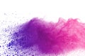 Colored powder explosion. Colored dust splatted. Royalty Free Stock Photo