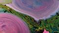 Colored psychedelic patterns of paint, colored liquid tapers