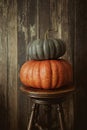 Colored pumpkins against wood background