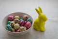 Colored quail eggs in a bowl