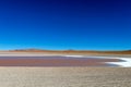 Colored Red Altiplanic Lagoon, a shallow saline lake in the southwest of the Altiplano of Bolivia