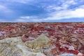 Colored rock formation against blue sky at Wucaitan Five Colored Hills aka Rainbow Beach Royalty Free Stock Photo