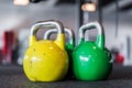 Colored round dumbbells in sport center Royalty Free Stock Photo