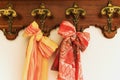 Colored scarves on antique hanger Royalty Free Stock Photo