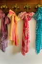 Colored scarves on antique hanger Royalty Free Stock Photo