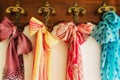 Colored scarves on antique hanger