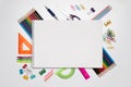 Colored school supplies for learning on a white background. Back to school. Pens, rulers, pencils and paper clips. Flat lay, top Royalty Free Stock Photo