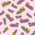 Colored seamless pattern of shoe prints. Vector illustration, design, doodle. Royalty Free Stock Photo