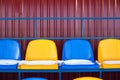 Colored seats snow covered in winter snowy stadium. Snow covered tribune