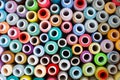 Colored sewing threads, a bunch of bright skeins of thread, close-up. Coils of thread of different colors for the Royalty Free Stock Photo