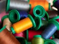 Colored sewing threads. Spools of multi-colored thread for sewing and embroidery machine Royalty Free Stock Photo