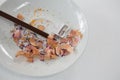 Colored shavings with brown color pencil and sharpener in saucer Royalty Free Stock Photo