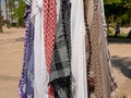 Colored shawls for sun protection are sold to tourists. Close-up. Luxor, Egypt Royalty Free Stock Photo