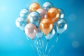 Colored shiny balloons on a blue background Royalty Free Stock Photo