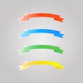 Colored shiny glass ribbons on a gray background . Royalty Free Stock Photo