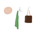 Colored shirt, bag and hat on a hanger for storage isolated on a white background