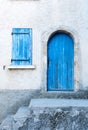 Colored shutters on an old facade