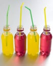 Colored soft drinks. Conceptual image Royalty Free Stock Photo