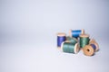 Colored spools of thread on a gray background Royalty Free Stock Photo