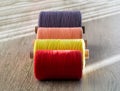 Colored spools of thread for sewing, front view Royalty Free Stock Photo