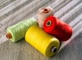 Colored spools of thread for sewing, top view Royalty Free Stock Photo