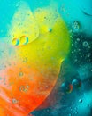 Colored spots circles on the water Royalty Free Stock Photo