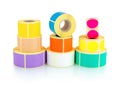 Colored square and circle label rolls isolated on white background with shadow reflection - clipping path. Color reels of labels