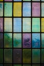 Colored stained glass window with regular block pattern blue green tone Royalty Free Stock Photo