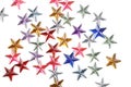 Colored stars confetti on white background Royalty Free Stock Photo