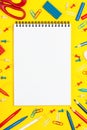 Colored stationery on a bright yellow background Royalty Free Stock Photo