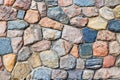 Colored stones in grey wall Royalty Free Stock Photo