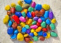 Colored stones lying on a flat surface Royalty Free Stock Photo