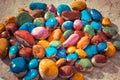 Colored stones lying on a flat surface Royalty Free Stock Photo